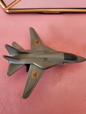 2019 Mattel Gray Military Jet Toy Plane with Red-Yellow Roundels